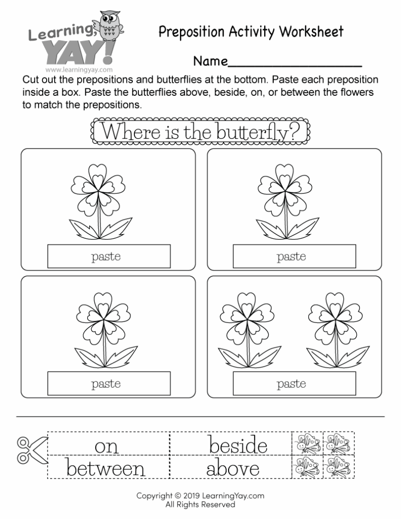 A preposition activity worksheet asks students to cut out butterflies and paste them on, beside, between, or above flowers. Four flower scenes have paste boxes, with word and butterfly cutouts at the bottom.